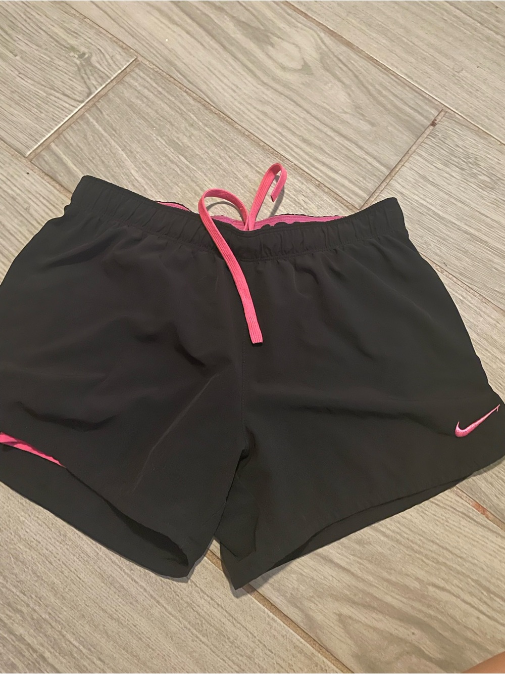 Nike Women's Black Athletic Shorts with Pink Accents